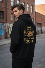 Side angle view of black faith hoodie with bold inspirational back graphic