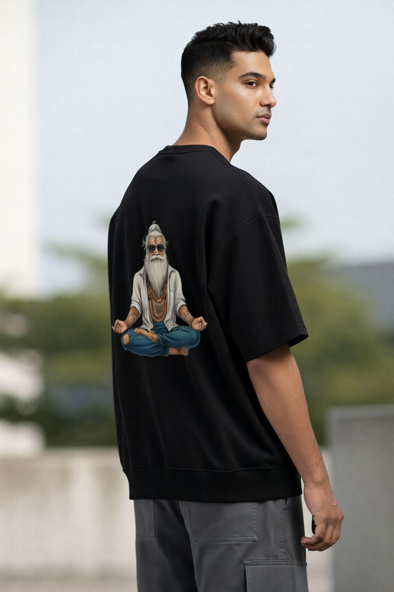 Black oversized t shirt for men with rishi back print lifestyle streetwear shot
