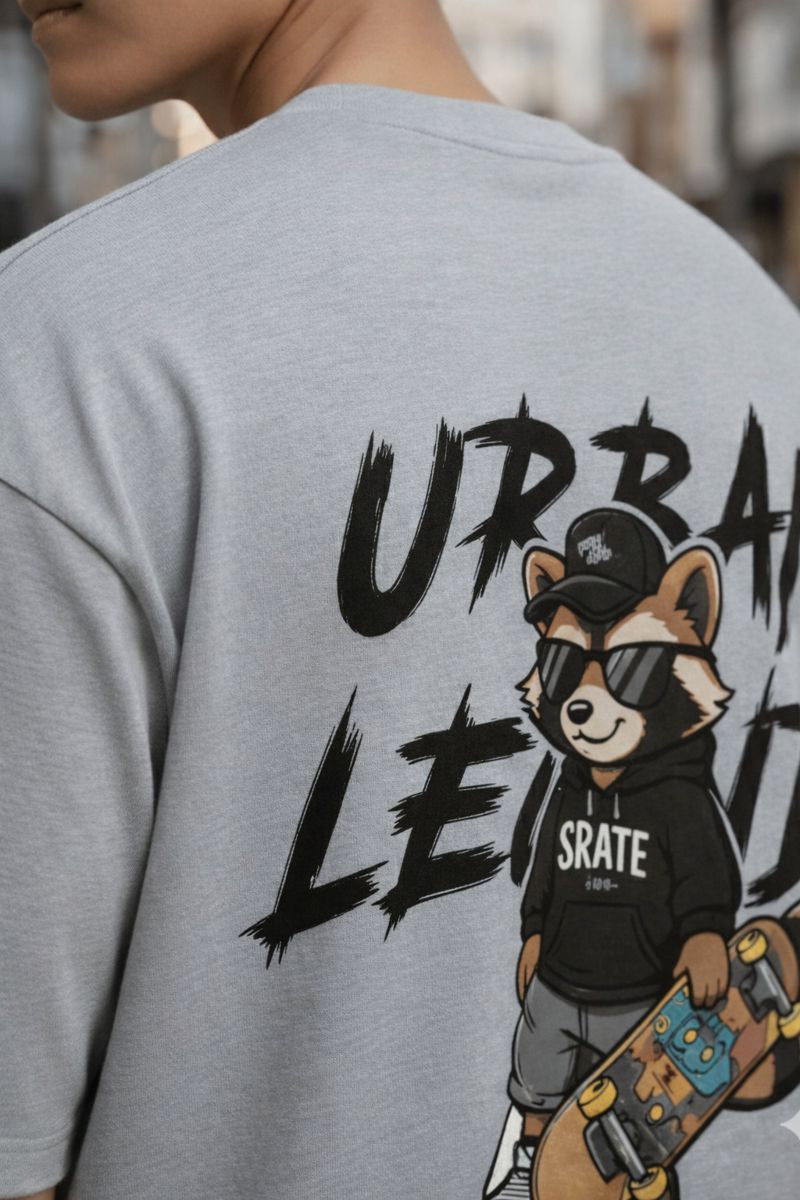 Close up of Urban Legends lucky charm skate graphic on grey t shirt